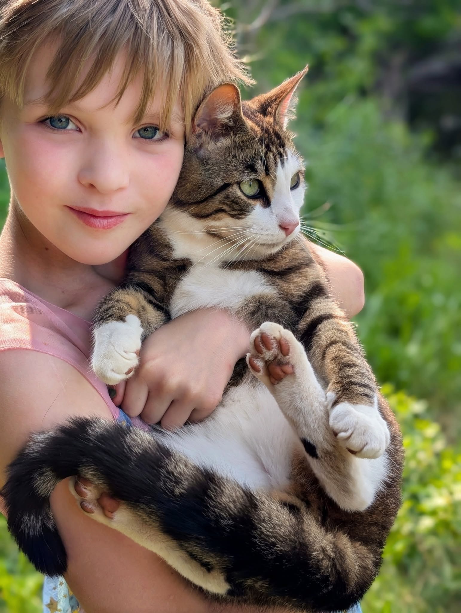 A girl and her farm cat