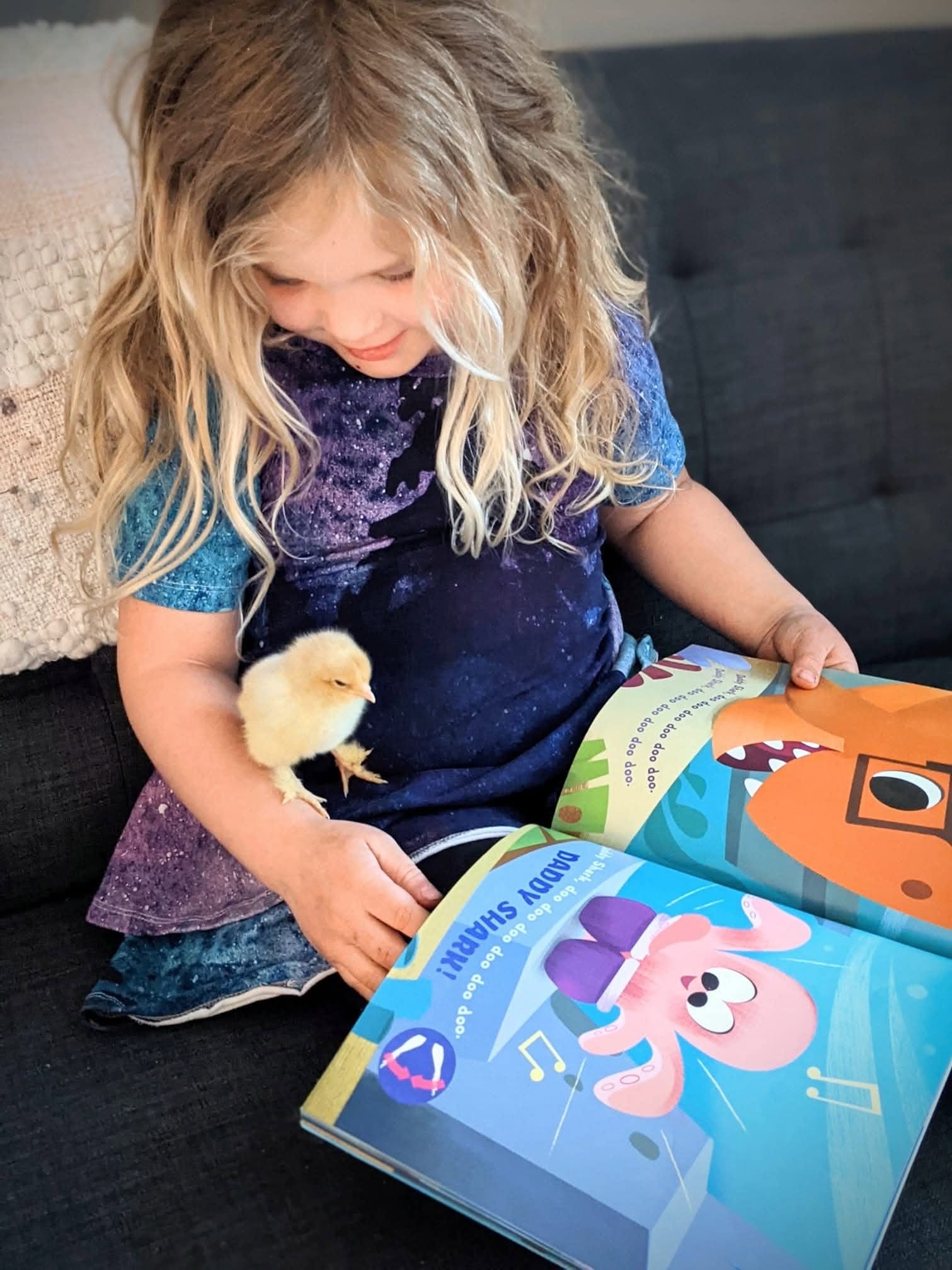 Reading with a chick